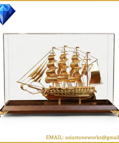 A sailboat crafted from pure bronze