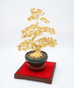 An Ochna integerrima blossom planter made of bronze